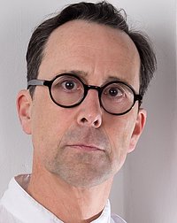 Fotopotrait des Bühnenbildners und Szenographen Jörg Zysik