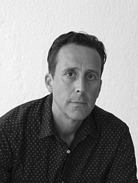 Fotopotrait des Bühnenbildners und Szenographen Jörg Zysik